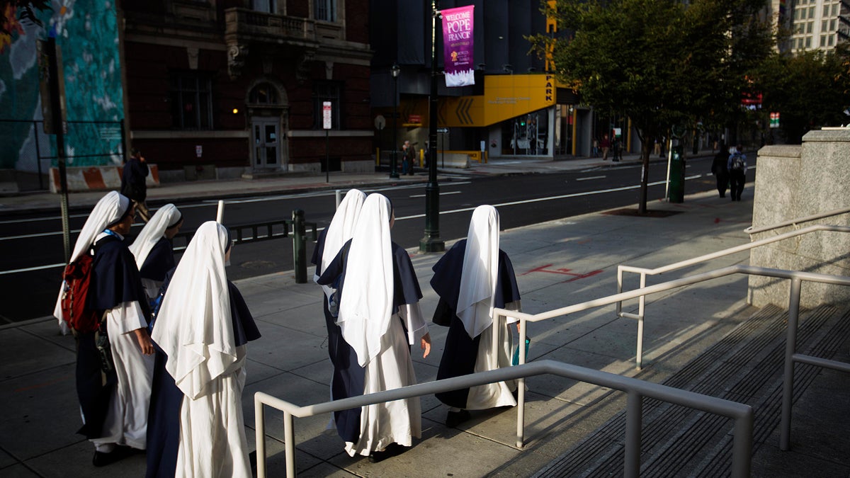  Nuns walk to the Pennsylvania Convention Center to attend the World Meeting of Families conference last month in Philadelphia. The event was one of several, Convention Center officials say, that illustrate a resurgence of the facility. (AP Photo/David Goldman) 