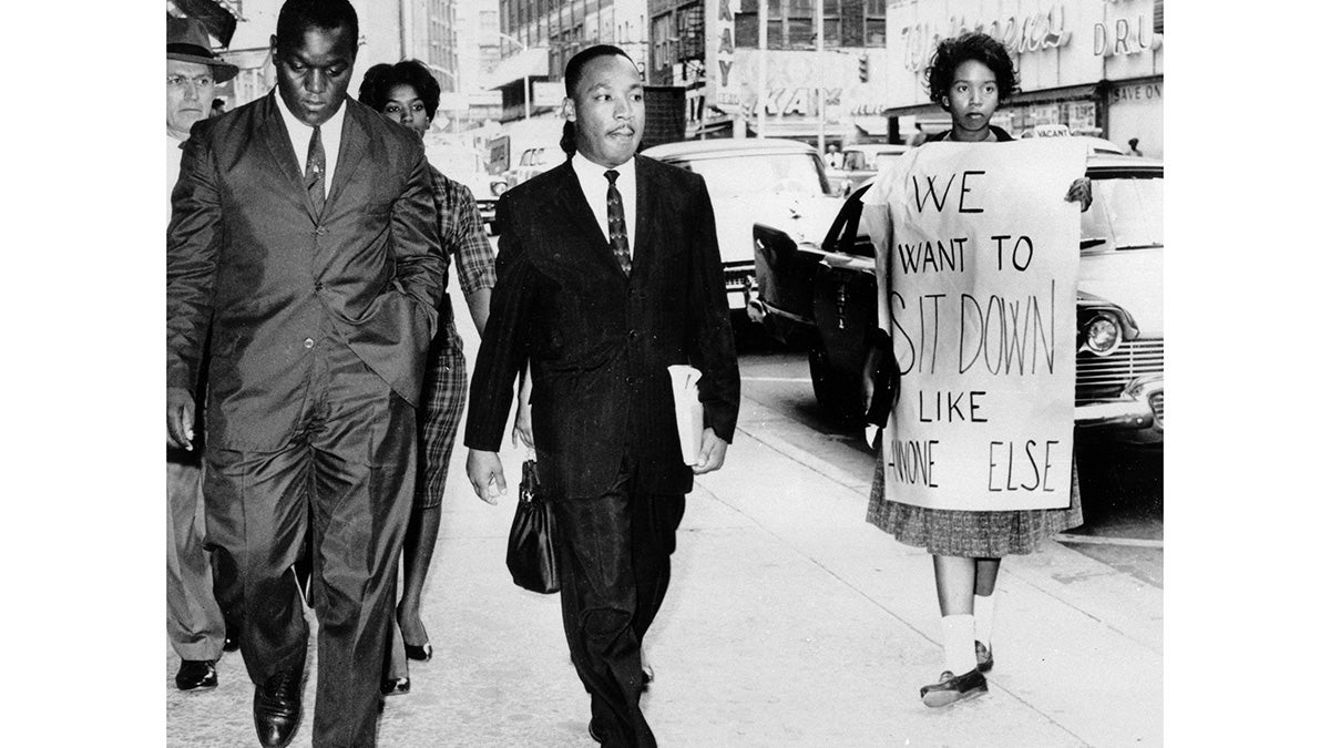 The Rev. Dr. Martin Luther King Jr. under arrest by Atlanta Police Capt. R.E. Little