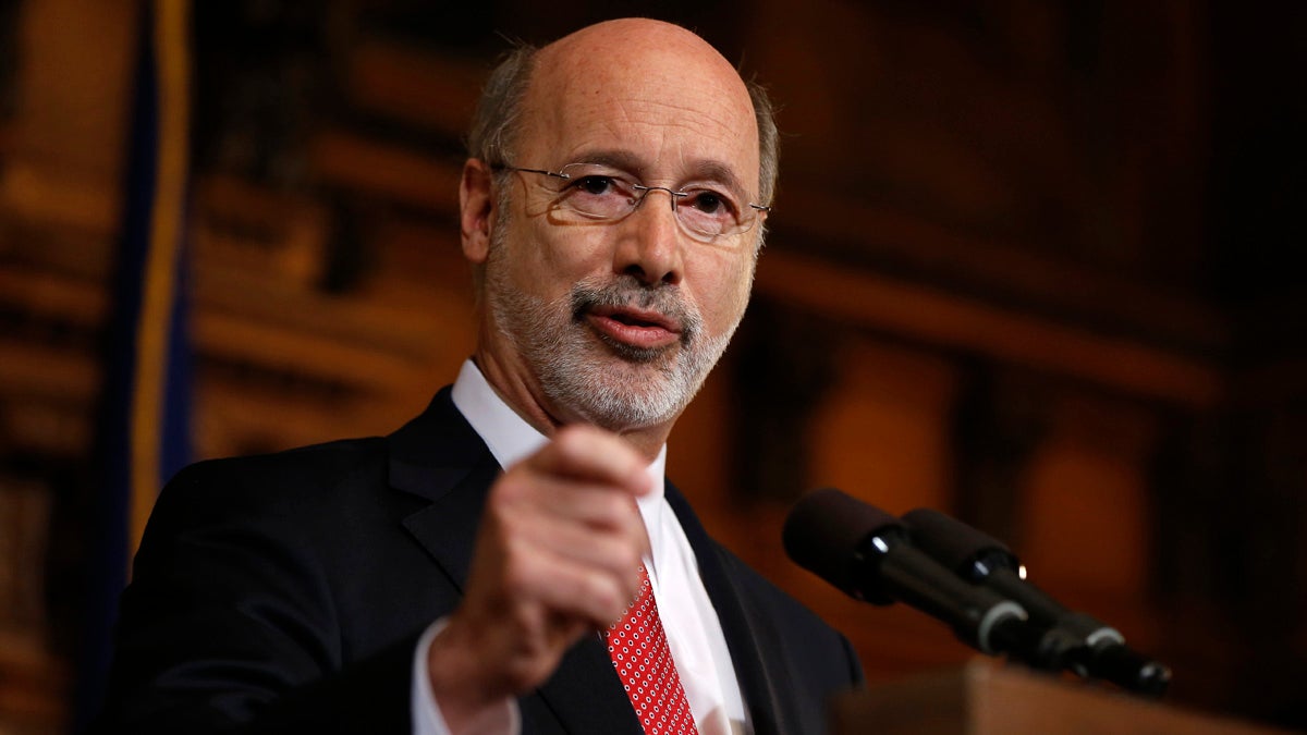  Pennsylvania Gov. Tom Wolf answers questions about his partial approval of a state budget Tuesday at the state Capitol in Harrisburg. Wolf  rejected parts of a $30.3 billion state budget plan that's already a record six months overdue, but he's freed up more than $23 billion in emergency funding. (AP Photo/Matt Rourke 