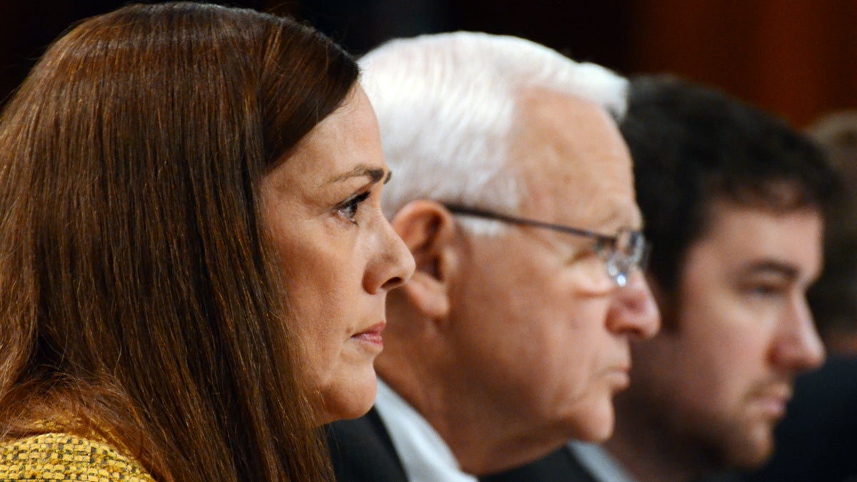  Pennsylvania Sens. Lisa Baker and Gene Yaw, center, listen during the first public hearing of a special Pennsylvania Senate committee set up to determine whether to seek removal proceedings against Attorney General Kathleen Kane Monday. (AP photo/Marc Levy) 