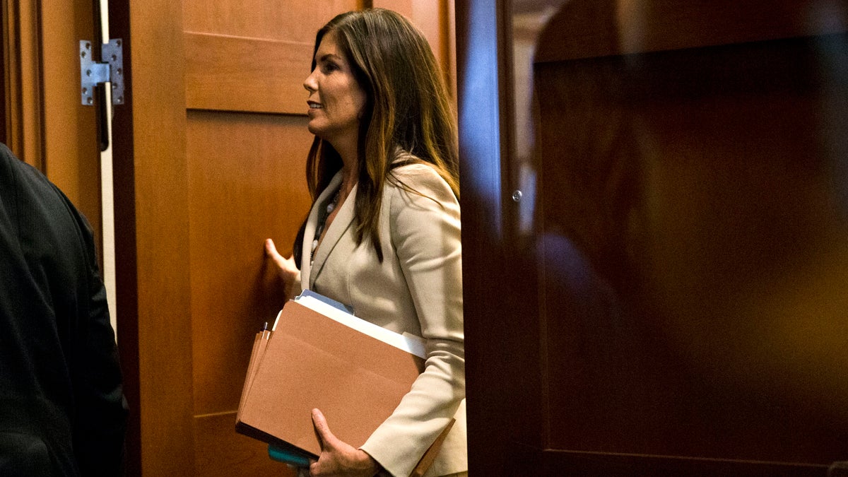  Pennsylvania Attorney General Kathleen Kane departs after a hearing Thursday  at the Pennsylvania Judicial Center in Harrisburg, Pennsylvania. Judge John Cleland ordered Kane to attend a closed-door hearing to be questioned under oath about any leaks by prosecutors or a judge of secret grand jury material from the child sexual abuse investigation of former Penn State assistant football coach Jerry Sandusky. (AP Photo/Matt Rourke) 