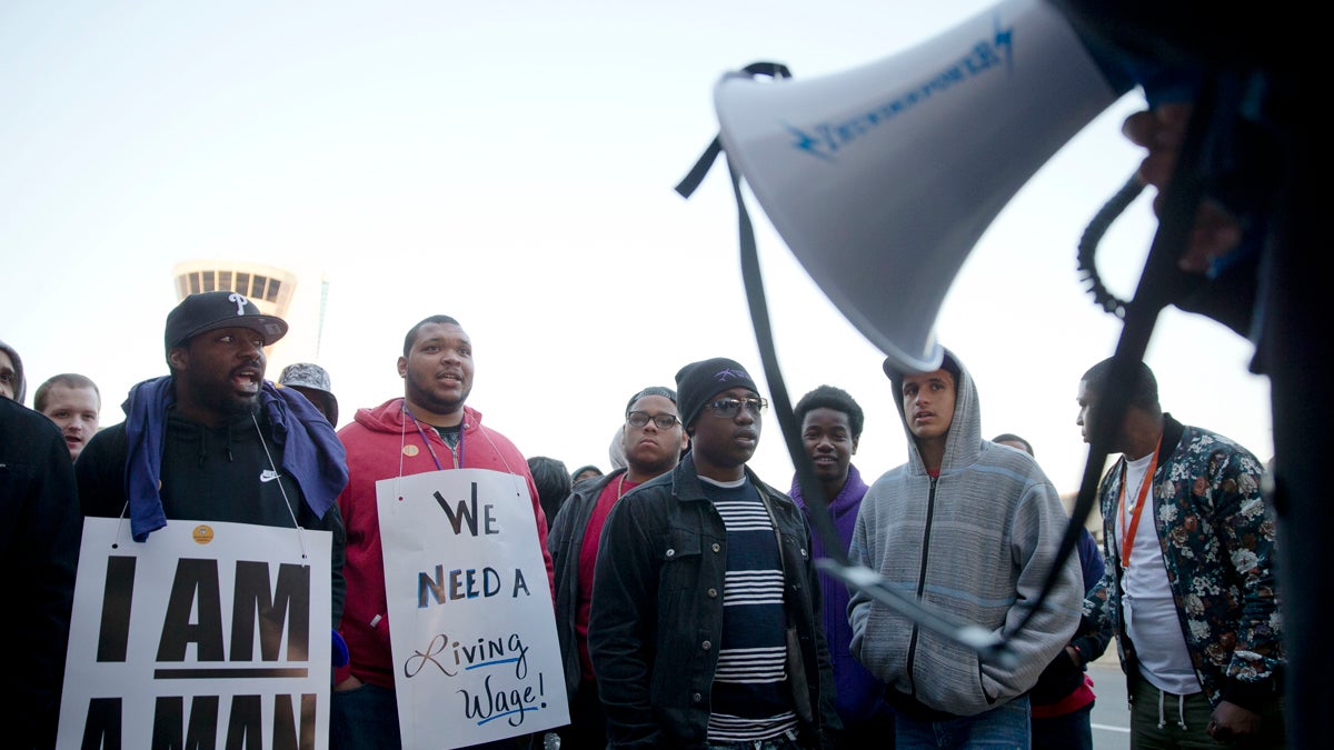  In this file photo, airport workers and their supporters picket, Thursday, April 2, 2015, at Philadelphia International Airport in Philadelphia.  (Matt Rourke/AP Photo, file) 