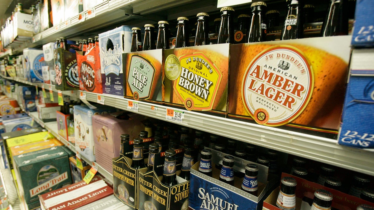  Various beer brands line store shelves. (Toby Talbot/AP Photo) 