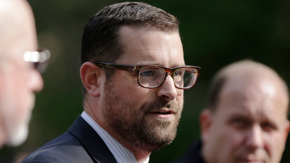 Pennsylvania state Rep. Brian Sims filmed an encounter with a protester at a Philadelphia Planned Parenthood facility, then posted the video. As she studiously ignored him, Sims tells viewers the woman had been confronting the people who were walking into the clinic. (AP file photo)