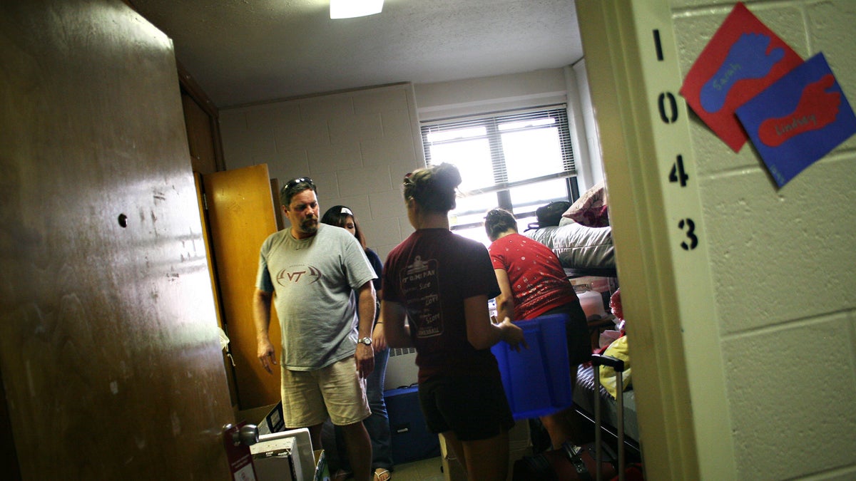  In this file photo, students get help from their parents as they move into their dorm rooms on the first floor of Virginia Tech's West Ambler-Johnson dormitory in Blacksburg, Va., Aug. 15, 2007. (Christina O'Connor/AP Photo, file) 