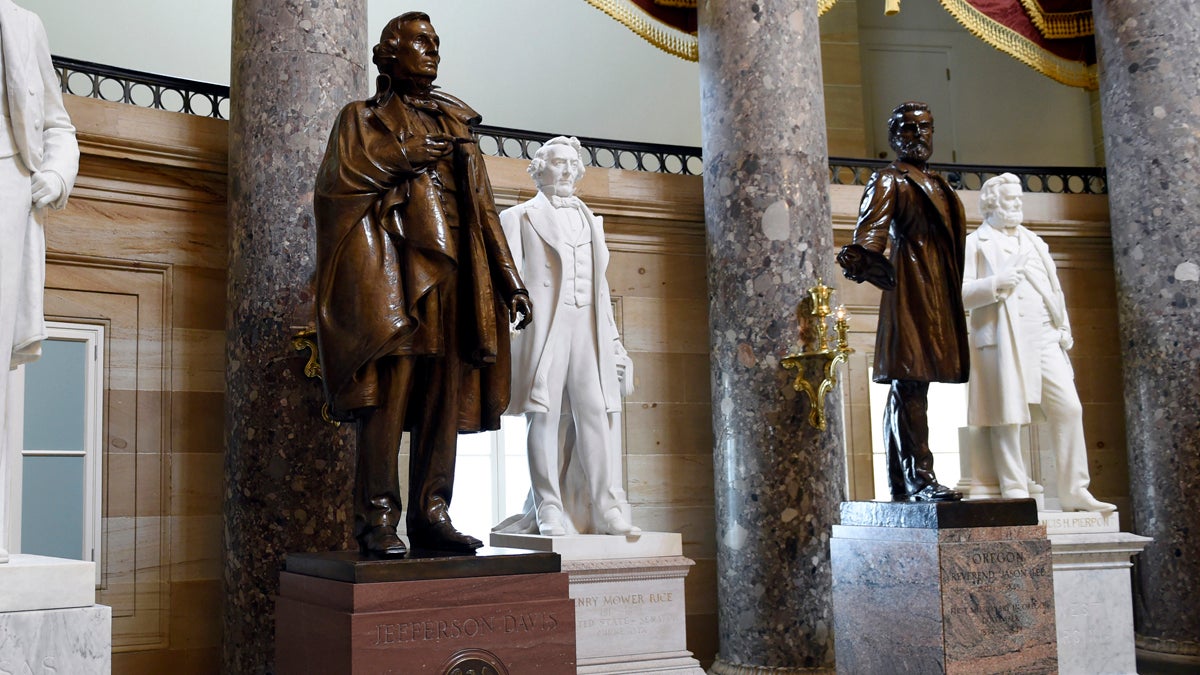  A statue of Jefferson Davis, (left), is on display in Statuary Hall on Capitol Hill in Washington, Wednesday, June 24, 2015. The statue was given to the National Statuary Hall Collection in the U.S. Capitol by Mississippi in 1931. Davis served the nation in many positions before being appointed president of the Confederate States during the Civil War, including Secretary of War, a member of the U.S. House of Representatives and a member of the U.S. Senate.  (Susan Walsh/AP Photo) 