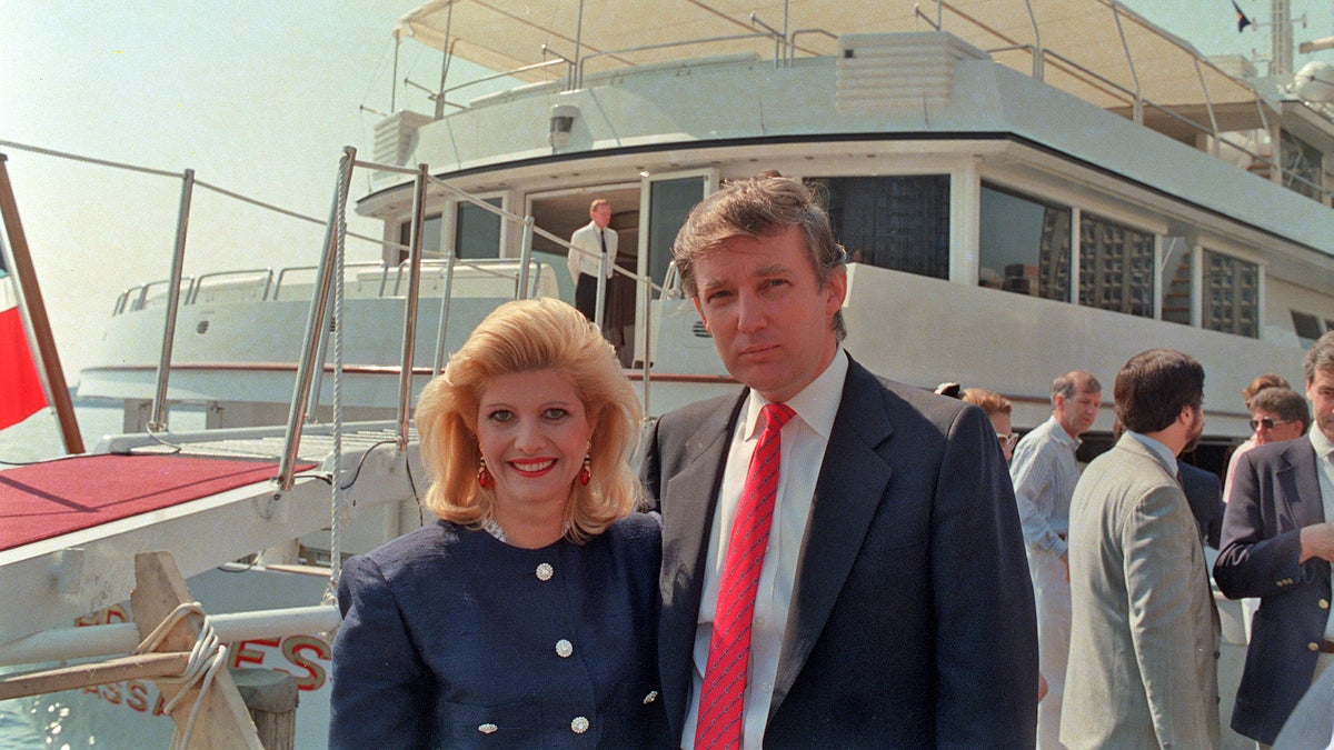 Real estate developer Donald Trump and his wife, Ivana, pose aboard their new luxury yacht The Trump Princess docked at the 30th Street pier on the East River in New York City, Monday, July 4, 1988. (Marty Lederhandler/AP Photo) 