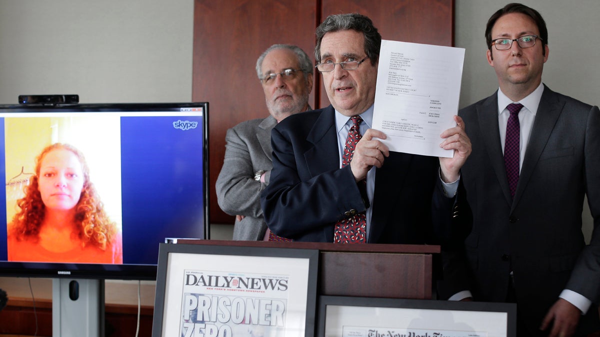  Attorney Norman Siegel, (center), along with Udi Ofer, (right), executive director of the American Civil Liberties Union of New Jersey, and attorney Steven Hyman, answers questions during a news conference, Thursday, Oct. 22, 2015, in New York. The ACLU along with two New York law firms, will be representing Kaci Hickox, (seen at left via Skype), in filing a lawsuit against Gov. Chris Christie and health officials. Hickox was the nurse who was detained last year after returning from treating Ebola patients in Sierra Leone. (Julie Jacobson/AP Photo) 