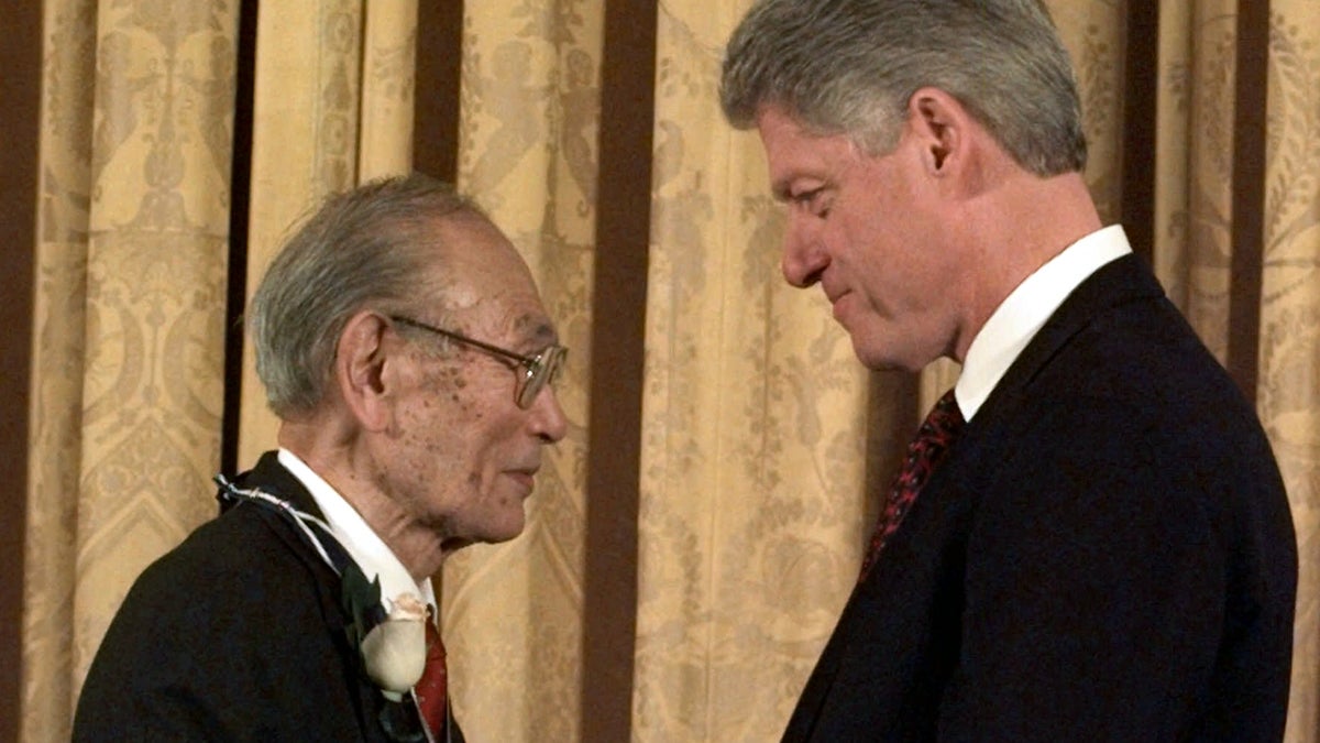  In this Jan. 15, 1998 file photo, President Clinton presents Fred Korematsu with a Presidential Medal of Freedom during a ceremony at the White House. On Thursday, May 20, 2010, the California state Assembly unanimously passed a bill designating Jan. 30 as Fred Korematsu Day of Civil Liberties and the Constitution in California. Korematsu, who died in 2005, was arrested in Oakland in 1942 after refusing to enter an internment camp. His case led the U.S. Supreme Court to examine the internment order's legality. (Dennis Cook/AP Photo, file) 
