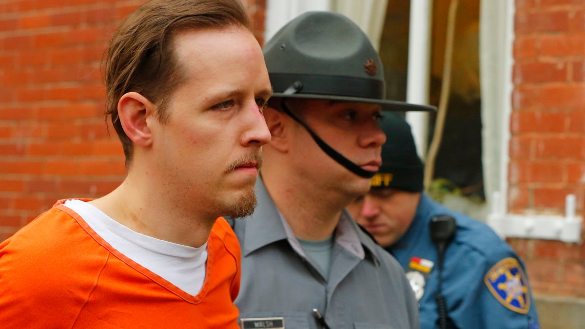  Eric Frein is escorted by police out the Pike County Courthouse after his arraignment in Milford, Pa., Friday Oct. 31, 2014. Frein, was captured seven weeks after police say he killed a Pennsylvania State trooper in an ambush outside a barracks in Northeastern Pennsylvania. (Rich Schultz/AP Photo) 