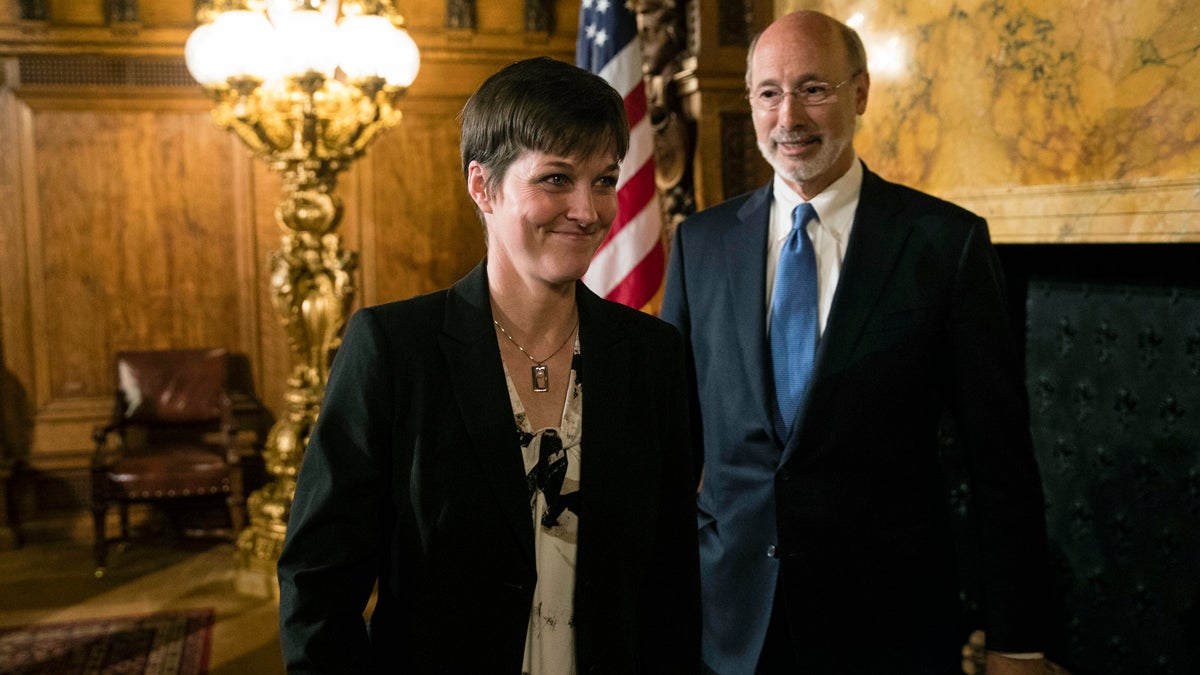  Teresa Miller accompanied by Gov. Tom Wolf depart a news conference at the Pennsylvania Capitol in Harrisburg, Pa., Tuesday, May 23, 2017. Wolf says he'll nominate his insurance commissioner, Miller, to lead a new agency overseeing public health and human services programs. (Matt Rourke/AP Photo) 