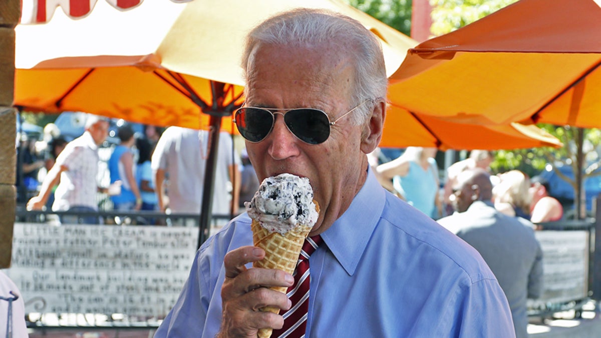  Vice President Joe Biden eats ice cream during a visit to Little Man Ice Cream, in Denver, Tuesday, July 21, 2015.  (Brennan Linsley/AP Photo) 
