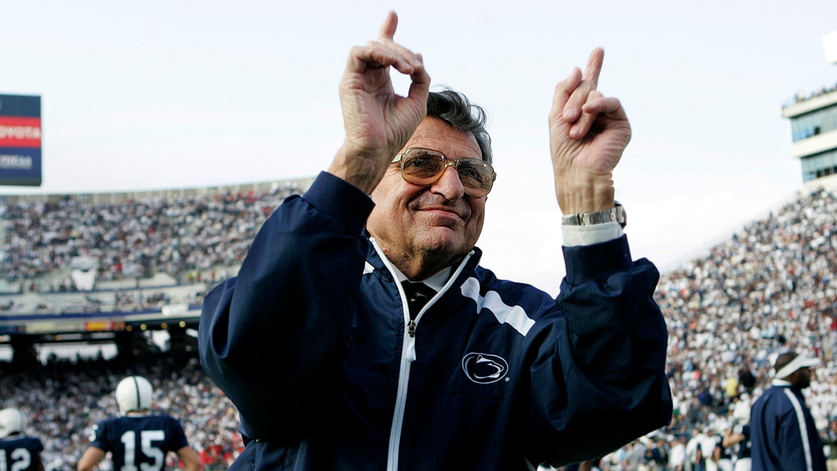 In this Nov. 5, 2005, file photo, Penn State football coach Joe Paterno acknowledges the crowd before an NCAA college football game against Wisconsin in State College, Pa. (Carolyn Kaster/AP Photo, file) 