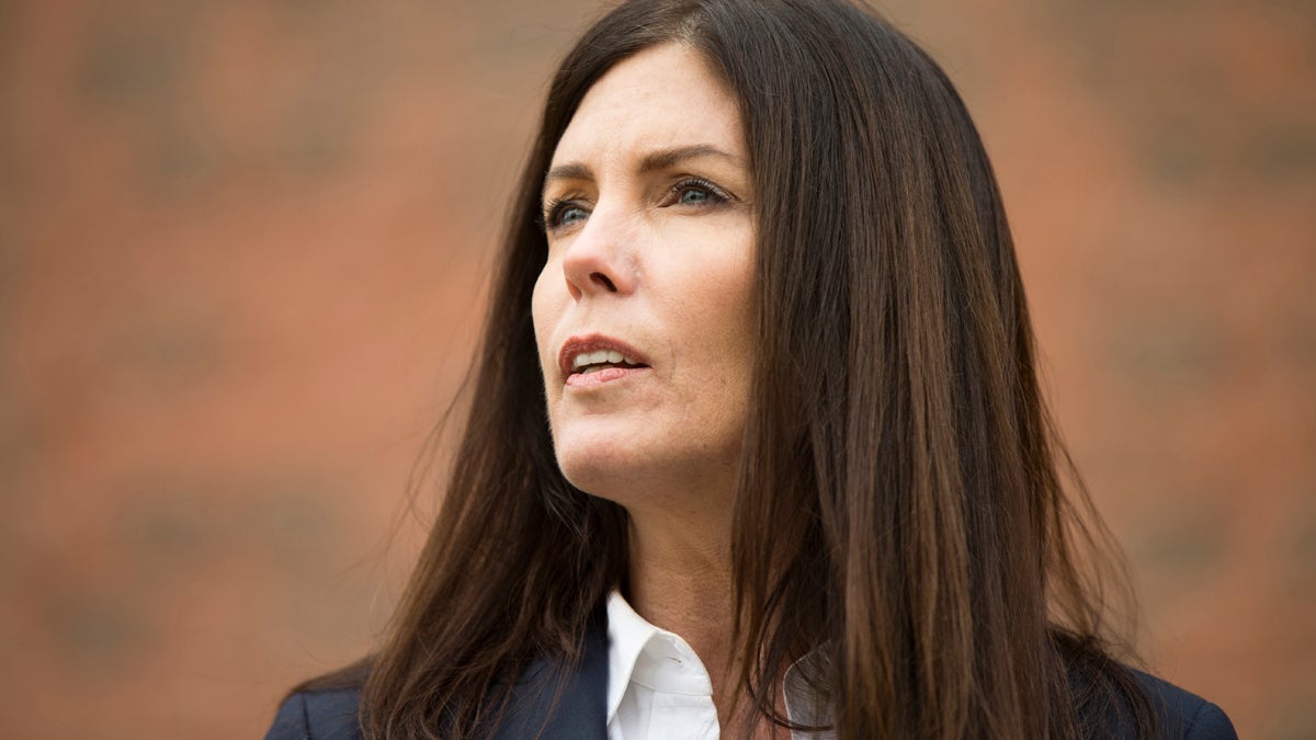 Attorney General Kathleen Kane speaks during a news conference Wednesday, Jan. 21, 2015, in Philadelphia. Court documents released Wednesday show a grand jury has concluded there are reasonable grounds to charge Kane with perjury, false swearing, official oppression and obstruction after an investigation into leaks of secret grand jury material. In an unrelated public appearance Wednesday in Philadelphia, Kane maintained her innocence. (Matt Rourke/AP Photo) 