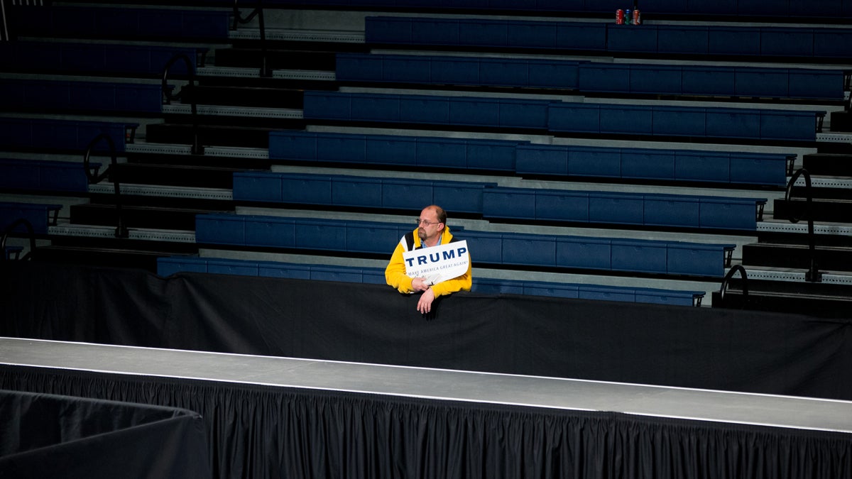 A member of the audience stands alone after a rally for Republican presidential candidate Donald Trump at Sumter Country Civic Center in Sumter, S.C., Wednesday, Feb. 17, 2016. (AP Photo/Andrew Harnik)