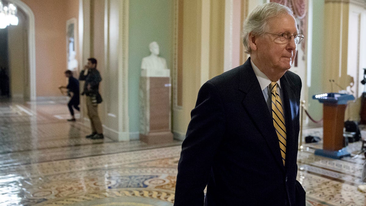  Senate Majority Leader Mitch McConnell of Ky. walks to the Senate Chamber on Capitol Hill in Washington, Tuesday, July 25, 2017. Republicans are showing signs of optimism that they'll be able to take up the health care bill. Senators and aides said talks were continuing that might win over enough Republicans to start debate. (Andrew Harnik/AP Photo) 
