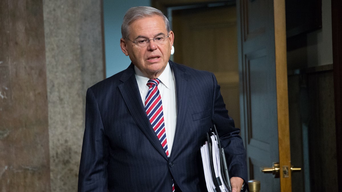  Sen. Bob Menendez, D-New Jersey, arrives before Secretary of State John Kerry, Secretary of Energy Ernest Moniz, and Secretary of Treasury Jack Lew arrive to testify at a Senate Foreign Relations Committee hearing on Capitol Hill, in Washington, Thursday, July 23, 2015, to review the Iran nuclear agreement. (Andrew Harnik/AP Photo) 