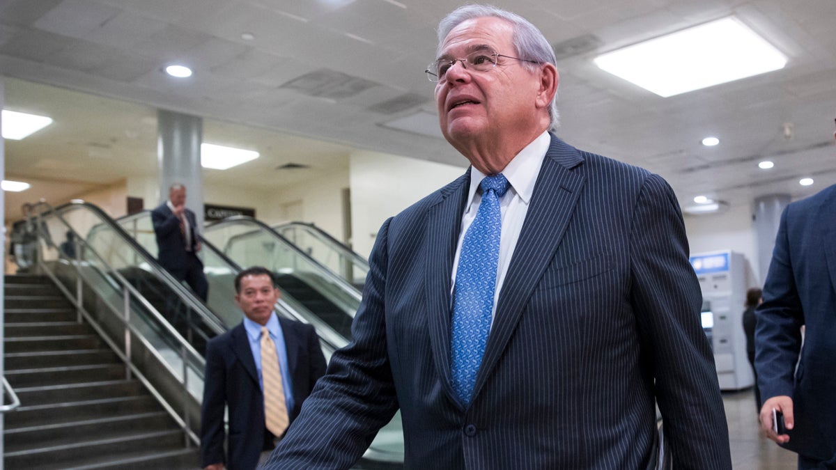  In this Aug. 2, 2017 file photo, Sen. Bob Menendez, D-N.J., arrives on Capitol Hill Washington, for a closed-door meeting with Secretary of State Rex Tillerson and Defense Secretary James Mattis. Menendez, charged with using his political influence to help a wealthy campaign donor, is trying to benefit from a U.S. Supreme Court decision reversing a jury verdict against former Virginia Republican Gov. Bob McDonnell. (J. Scott Applewhite/AP Photo, File) 