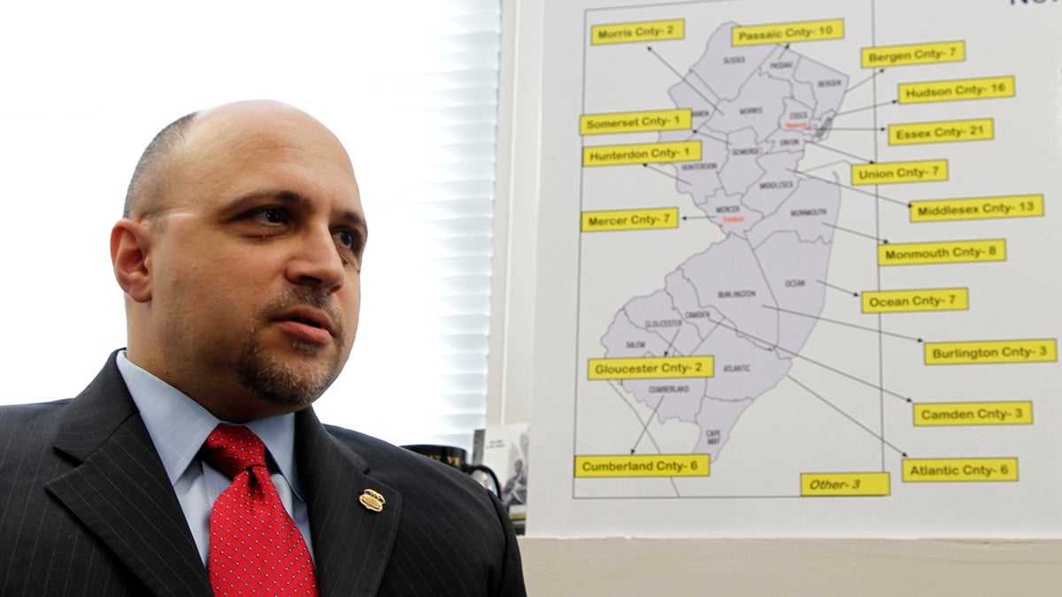  John Tsoukaris, director of the Newark field office for the U.S. Immigration and Customs Enforcement, talks about the arrests of 123 illegal immigrants in New Jersey during operation Cross Check III during an interview with The Associated Press, Monday, April 2, 2012, in Newark, N.J. The Obama administration said it arrested more than 3,100 immigrants who were illegally in the country and who were convicted of serious crimes or otherwise considered fugitives or threats to national security. It was part of a six-day nationwide sweep that the government described as the largest of its kind. (Julio Cortez/AP Photo) 