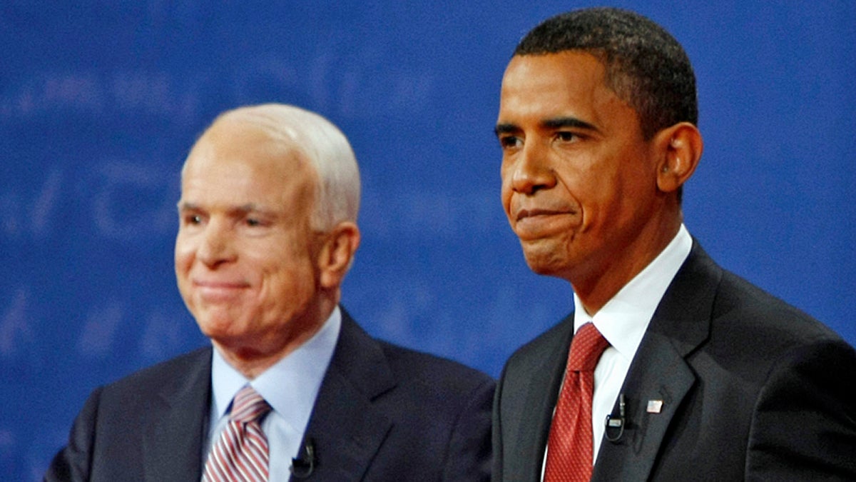  Republican presidential candidate, Sen. John McCain, R-Ariz., and then-presidential candidate, Sen. Barack Obama, D-Ill., on stage at the conclusion of a presidential debate at the University of Mississippi in Oxford, Miss. Friday, Sept. 26, 2008. (Gerald Herbert/AP Photo) 