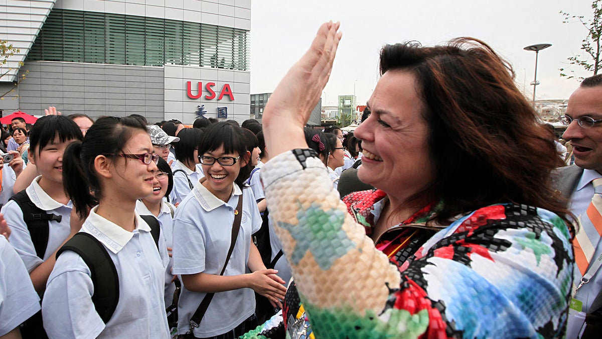  Allison Vulgamore,  Philadelphia Orchestra's president and CEO, pictured in this May 2010 file photo greeting Chinese students from local girl's middle school in Shanghai, China, is stepping down. (Eugene Hoshiko/AP Photo) 