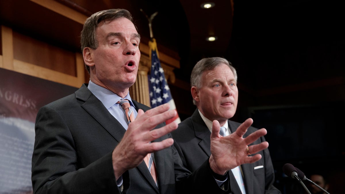  Senate Intelligence Committee Vice Chairman Sen. Mark Warner, D-Va., (left), and Committee Chairman Sen. Richard Burr, R-N.C., meet with reporters on Capitol Hill in Washington, Wednesday, March 29, 2017, to discuss their panel's investigation of Russian interference in the 2016 election. (J. Scott Applewhite/AP Photo) 