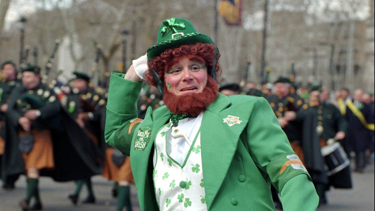 In this file photo, retired Philadelphia police Sgt. Chuck Warren struts down the Benjamin Franklin Parkway in Philadelphia dressed as a leprechaun for the annual St. Patrick's Day Parade. (Jim Graham/AP Photo, file) 