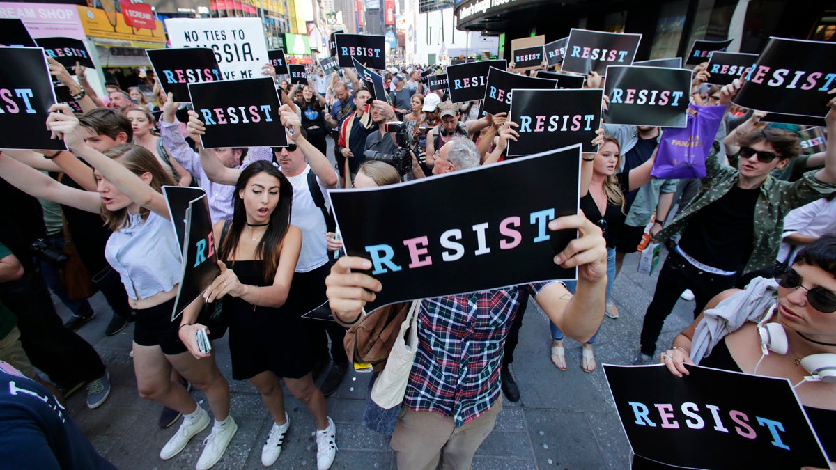  Protestors gather in Times Square, Wednesday, July 26, 2017, in New York. President Donald Trump declared a ban Wednesday on transgender troops serving anywhere in the U.S. military, catching the Pentagon flat-footed and unable to explain what it called Trump's 'guidance.' (Frank Franklin II/AP Photo)  