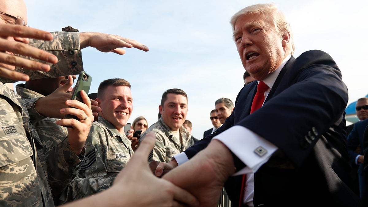  President Donald Trump greets members of the military as he arrives on Air Force One at Harrisburg International Airport in Middletown, Pa., Saturday, April, 29, 2017. (Carolyn Kaster/AP Photo) 