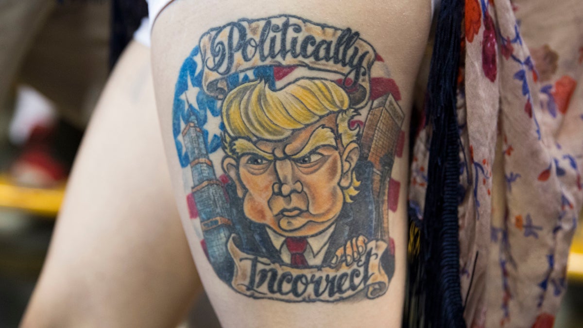  In this July 27, 2016 file photo, Jennifer Pitta shows off a tattoo of Republican presidential candidate Donald Trump during a campaign rally at Lackawanna College, in Scranton, Pa. (Evan Vucci/AP Photo, file) 