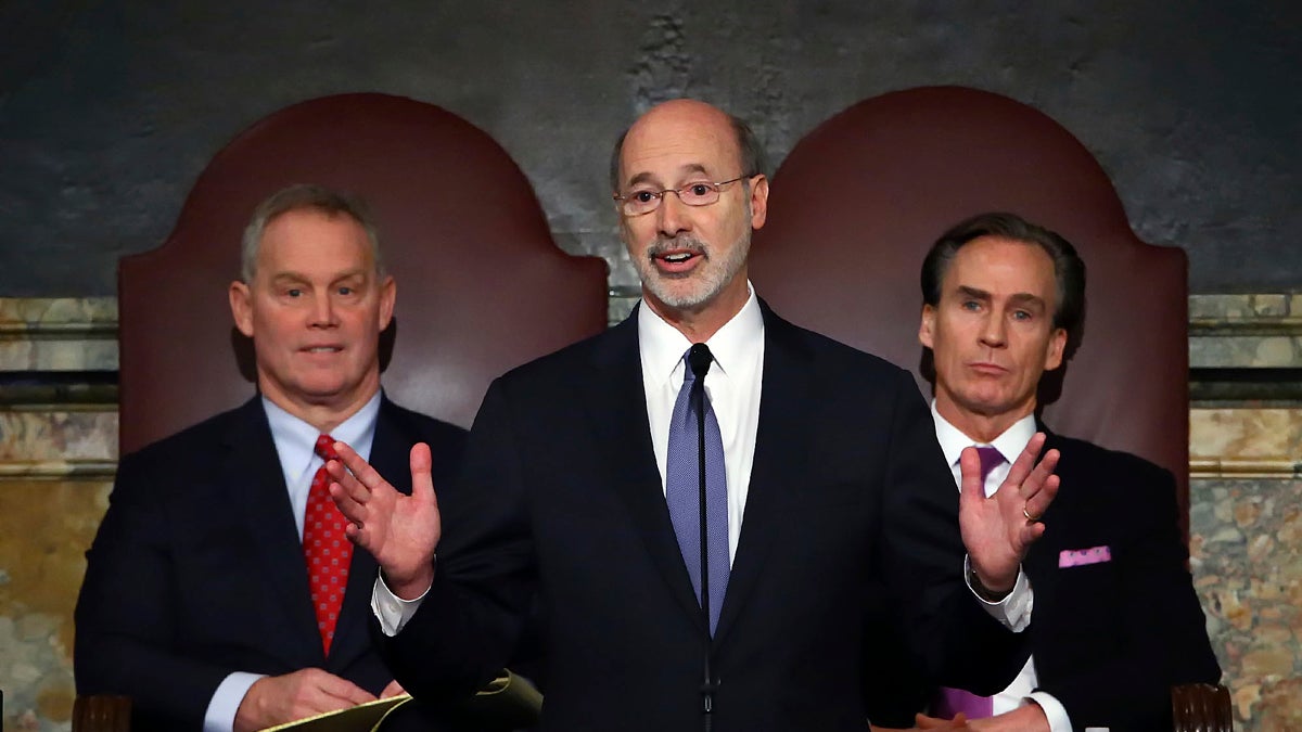  In this Feb. 9, 2016, file photo, Gov. Tom Wolf, (center), delivers his budget address for the 2016-17 fiscal year to a joint session of the Pennsylvania House and Senate, as the speaker of the state House of Representatives, state Rep. Mike Turzai, R-Allegheny, (left), and Lt. Gov. Mike Stack, (right), listen at the State Capitol in Harrisburg, Pa. (Chris Knight/AP Photo, file) 