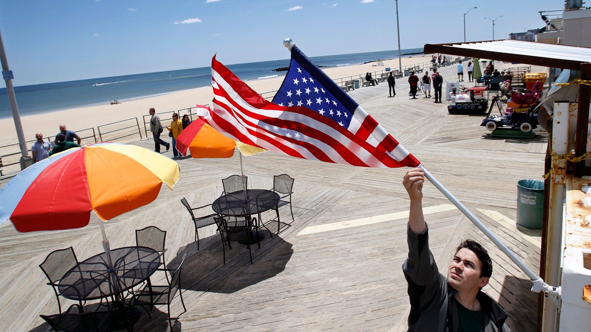  A boardwalk restaurant in Asbury Park, N.J., where one of Marilyn Schlossbach's businesses is located, opens on a recent Sunday morning. While Superstorm Sandy recovery continues, the Jersey Shore to a large extent has been cleaned up, rebuilt, and reopened. (AP Photo/Mel Evans) 