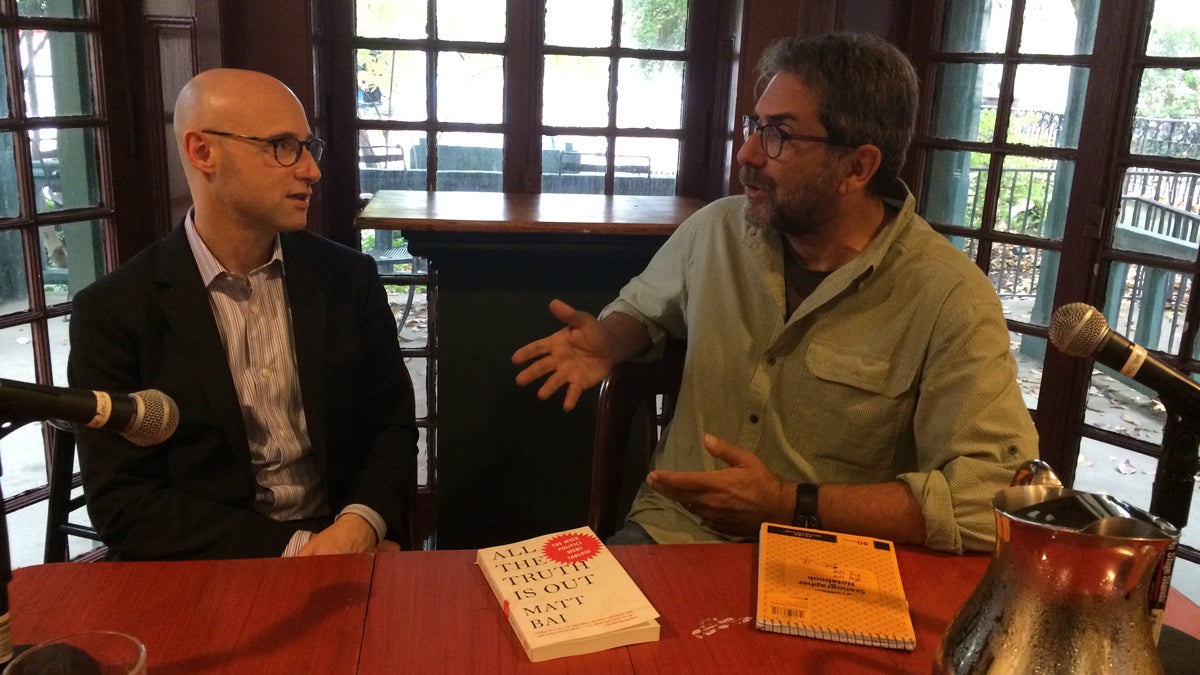  Dick Polman (right) spoke with political columnist Matt Bai at the University of Pennsylvania's Kelly Writers House on Thursday. (Amy Quinn/WHYY) 
