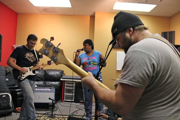 <p><p>Article 15 members (from left) Brian McNally, Ericka Glenn and Frank Slater practice at the School of Rock in Cherry Hill. (Emma Lee/for NewsWorks)</p></p>
