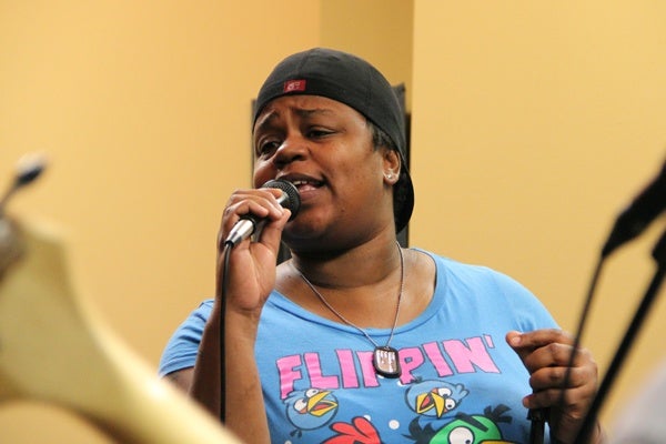<p><p>Ericka Glenn belts out a song with her Article 15 band mates during rehearsal in Cherry Hill. (Emma Lee/for NewsWorks)</p></p>
