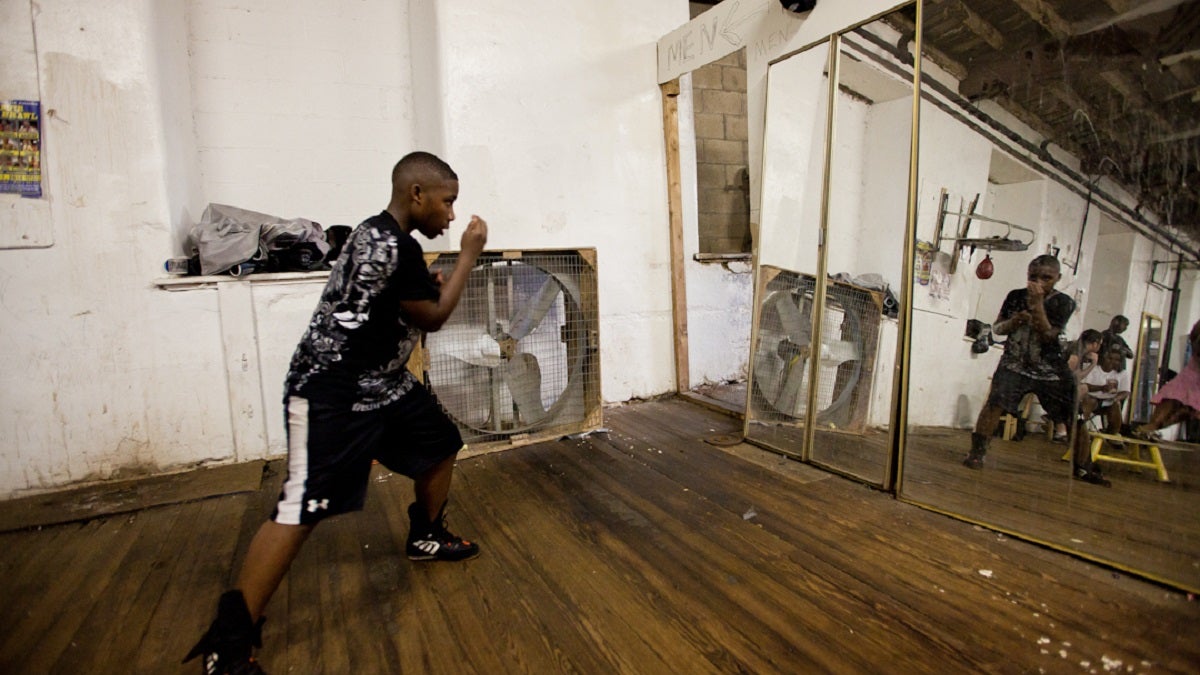 barnett_boxing-8 James Barnett warms up for a day of training at Bozy's Dungeon boxing gym in East Germantown. (Brad Larrison/for NewsWorks)