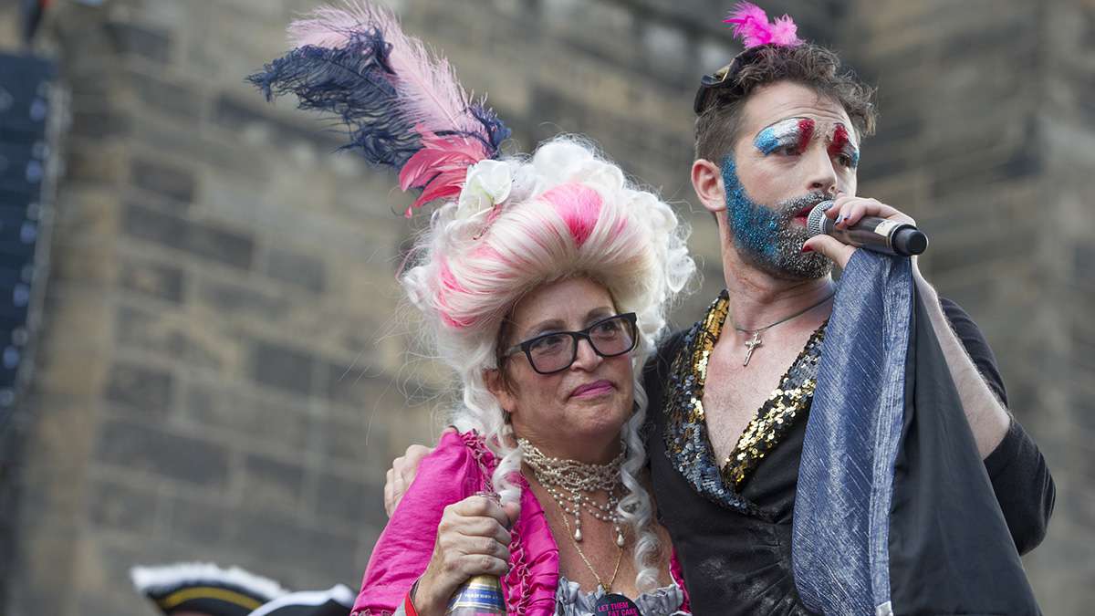 At the conclusion of the Bastille Day performance, 'Marie Antoinette' and 'Edith Piaf' make amends, sparing Antoinette the guillotine.