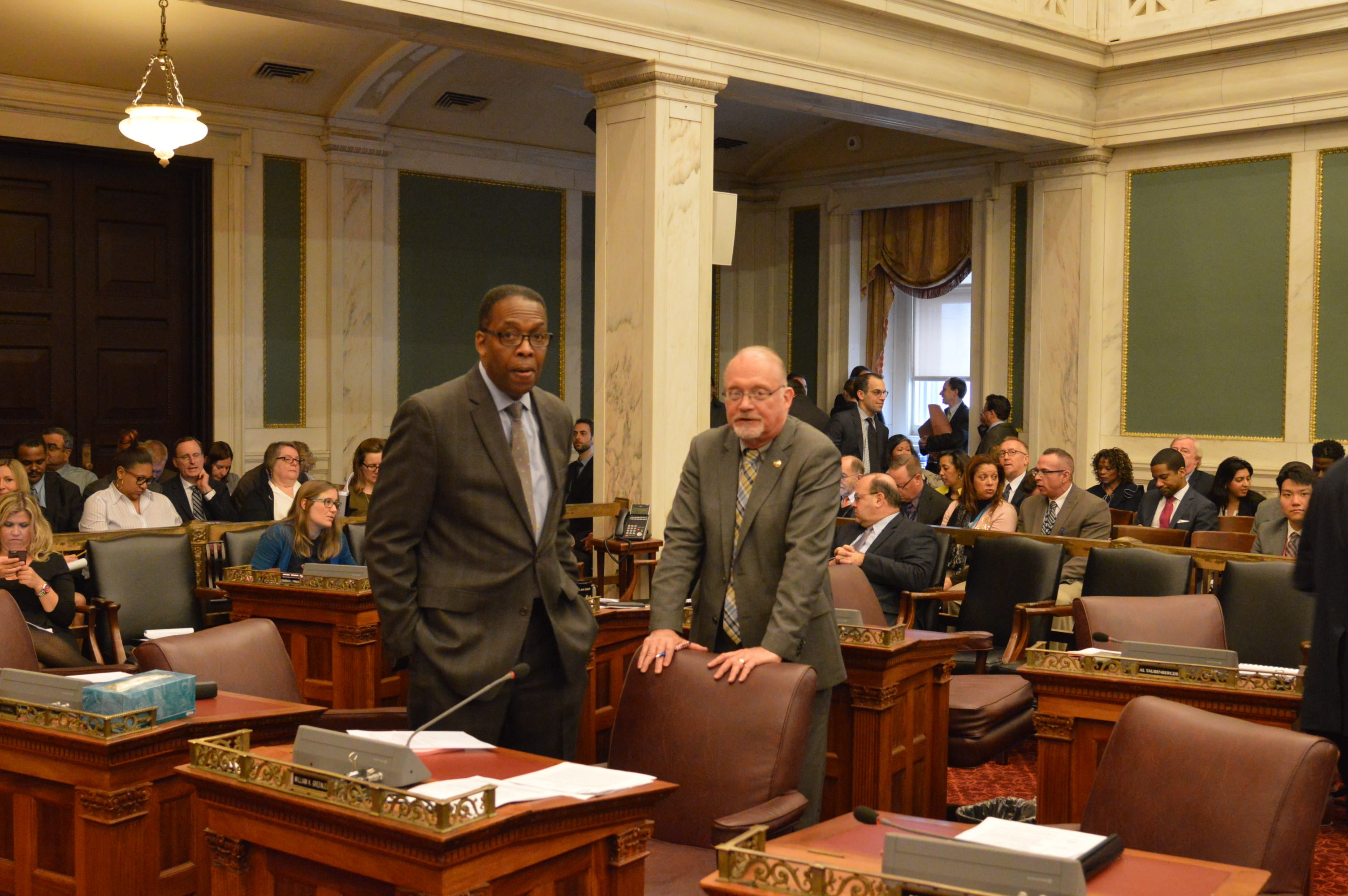  Philadelphia Council President Darrell Clarke and Councilman Bill Greenlee confer Tuesday. (Tom MacDonald/WHYY) 