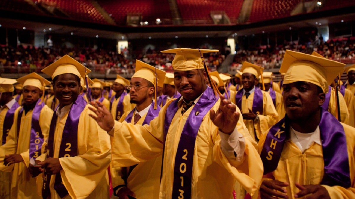  As the song playing in the background hints, the graduates of MLK High School believe they can fly. (Brad Larrison/for NewsWorks) 