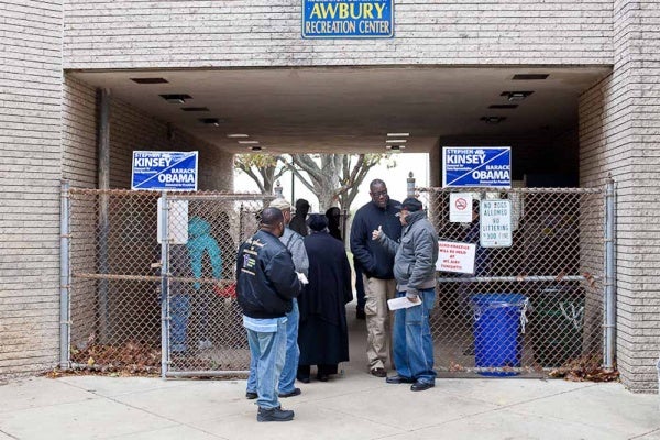 <p><p>Voters line up outside the Awbury Recreation Center in Germantown Tuesday Morning. (Brad Larrison/For NewsWorks)</p></p>
