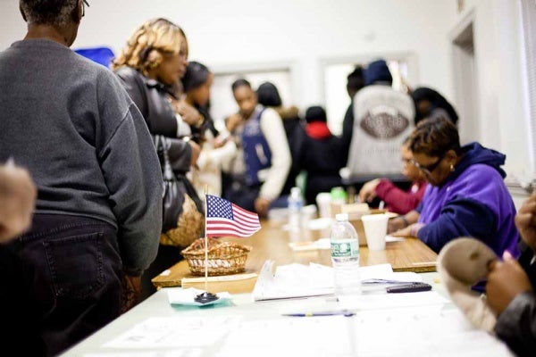 <p><p>Voters line up to check in with poll workers at Morton Homes polling place Tuesday morning. (Brad Larrison/For NewsWorks)</p></p>
