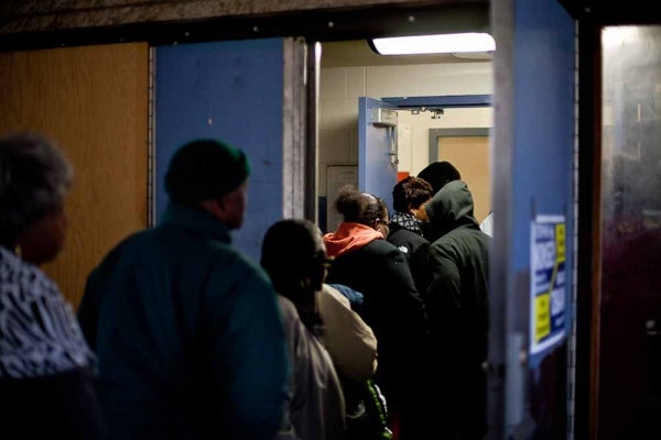 <p><p>Voters wait in line to cast their ballots at the Awbury Recreation Center in Germantown Tuesday morning. (Brad Larrison/For NewsWorks)</p></p>
