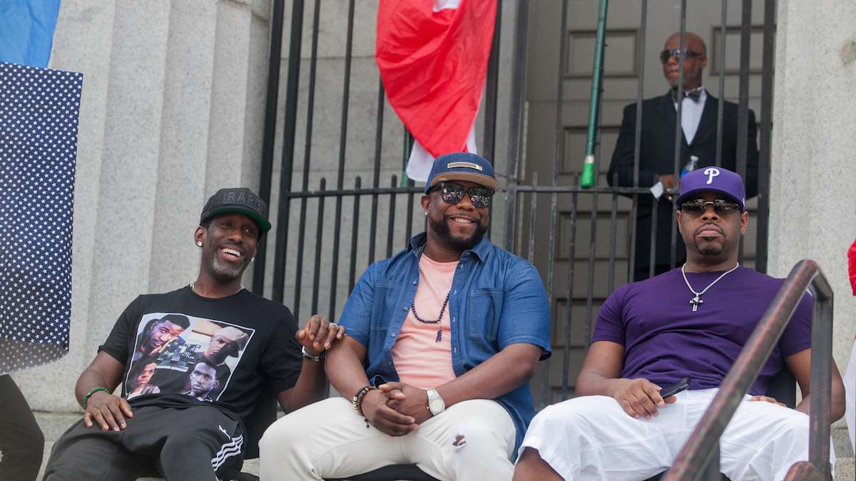 Boyz II Men sit at an unveiling of the newly named Boyz II Men Boulevard on Broad Street between Christian and Carpenter Streets.