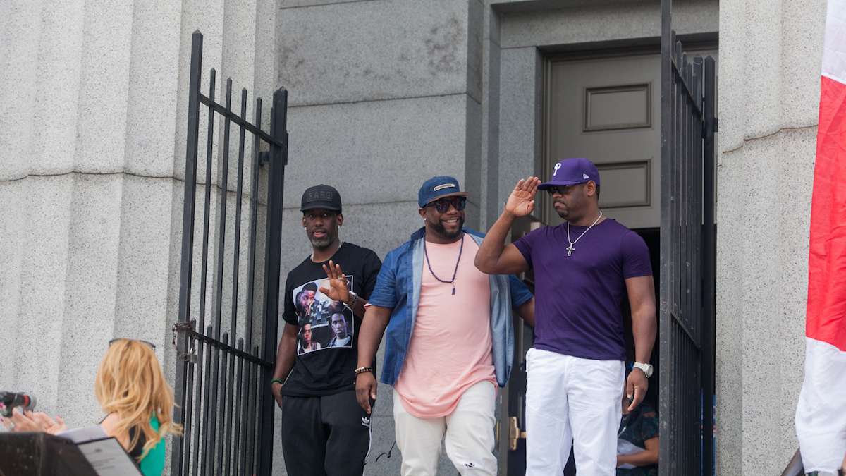 Boyz II Men exit their Alma Mater the Philadelphia High School for Creative and Performing Arts.