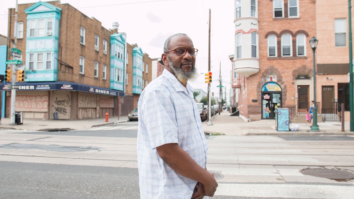 Alfred Tribble considers filing a lawsuit against the Philadelphia Police Department after his son was injured by an off-duty police officer in Brewerytown. (Annette John-Hall/WHYY)