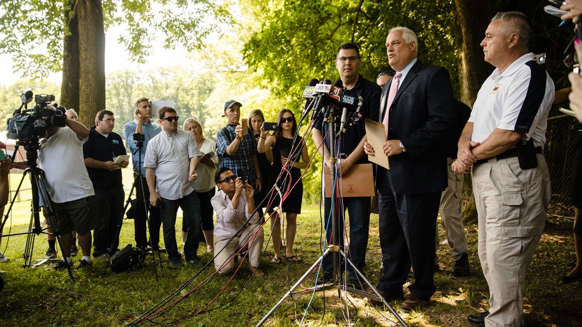  Matthew Weintraub, District Attorney for Bucks County, Pa., second right, speaks with members of the media, Wednesday, July 12, 2017, in Solebury, Pa. (AP Photo/Matt Rourke) 