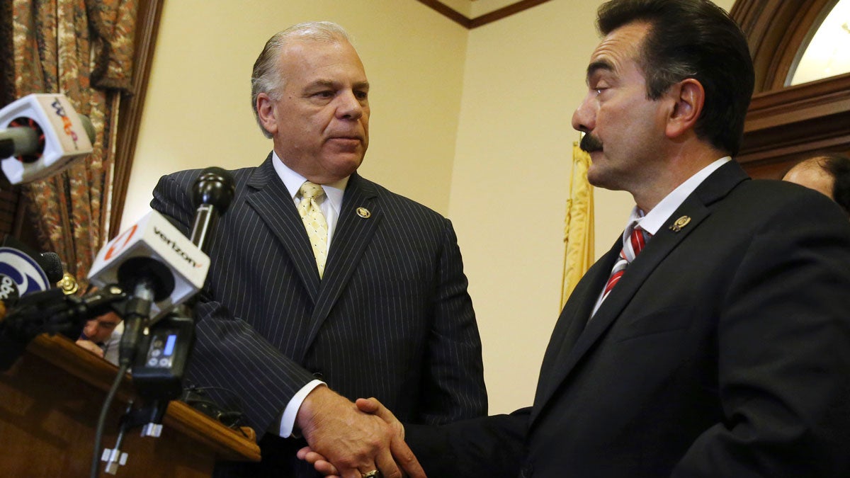  New Jersey Senate President Steve Sweeney, left, D-West Deptford, and New Jersey Democratic Assembly Speaker Vincent Prieto, right, D-Secaucus,shake hands as they announce an agreement to end the New Jersey budget impasse Monday, July 3, 2017, in Trenton, N.J. (AP Photo/Mel Evans) 