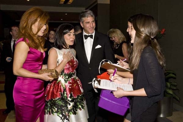 <p><p>Honoree Stephanie Lawrence (center), with Dr. Jennifer Simmons and her husband, Albert, buying grand prize drawing tickets, for a chance to win a Harry Winston watch or a 12-month lease to a 2012 Mercedes-Benz (Photo courtesy of Zoey Sless-Kitain)</p></p>
