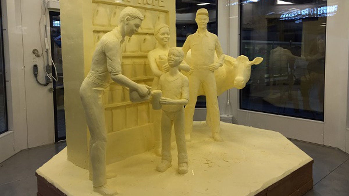  Jim Victor and Marie Pelton of Conshohocken created the massive butter sculpture that's the centerpiece of the Pennsylvania Farm Show. (Mary Wilson/WHYY) 