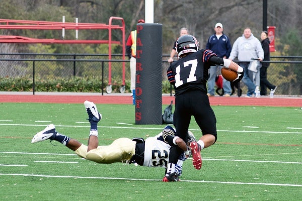 <p><p>A Penn Charter player tries to block a Patriot from scoring. (Bas Slabbers/for NewsWorks)</p></p>
